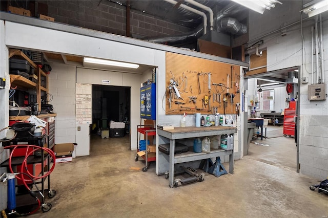 1826 Raab Ave, Belleville, IL 62226 - below grade area featuring a workshop area and concrete block wall
