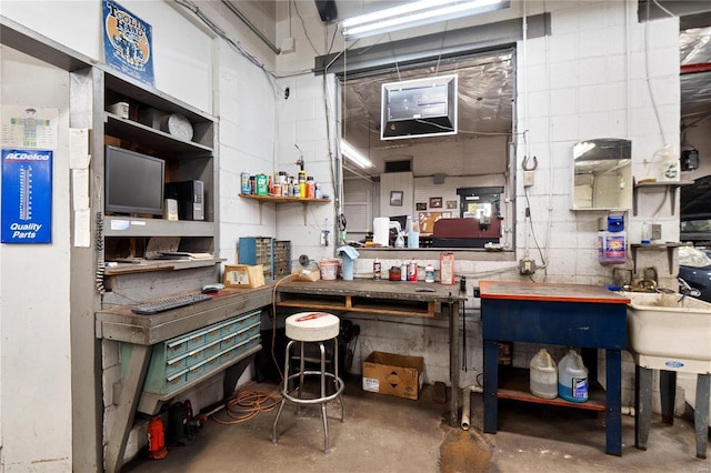 1826 Raab Ave, Belleville, IL 62226 - misc room featuring unfinished concrete flooring and a workshop area