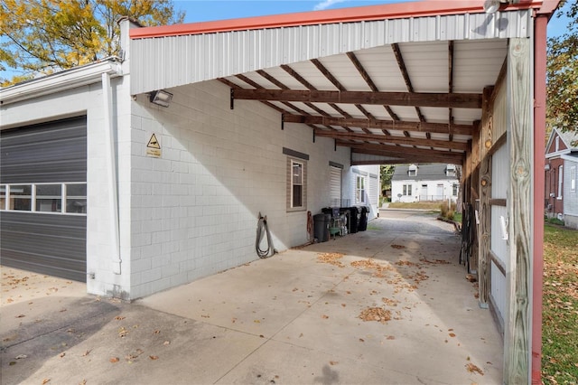 1826 Raab Ave, Belleville, IL 62226 - view of parking / parking lot featuring concrete driveway and a carport