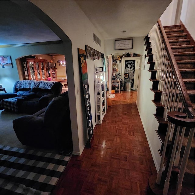660 W 3rd, Trenton, IL 62293 - hallway featuring arched walkways, baseboards, and stairs
