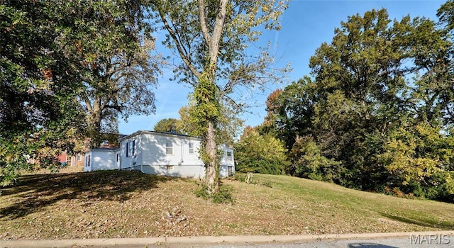 509 Royal Ave, Ferguson, MO 63135 - view of home's exterior featuring a yard