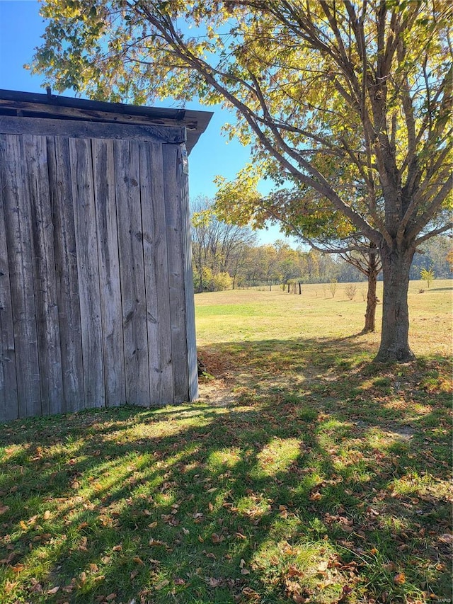 2724 Wayne Rte # Oo, Greenville, MO 63944 - view of grassy yard with a storage unit and an outbuilding