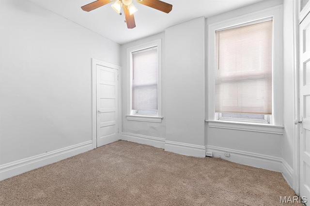 3921 Shenandoah Ave, Saint Louis, MO 63110 - carpeted empty room featuring a ceiling fan and baseboards
