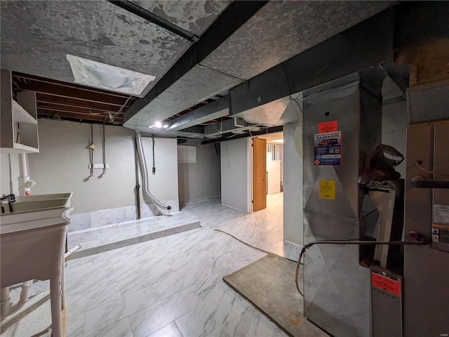 7 Carole Ln, Frontenac, MO 63131 - below grade area with light marble finish flooring and a sink