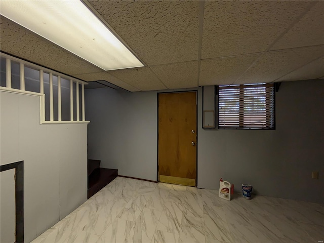 7 Carole Ln, Frontenac, MO 63131 - below grade area with marble finish floors, a drop ceiling, and stairs