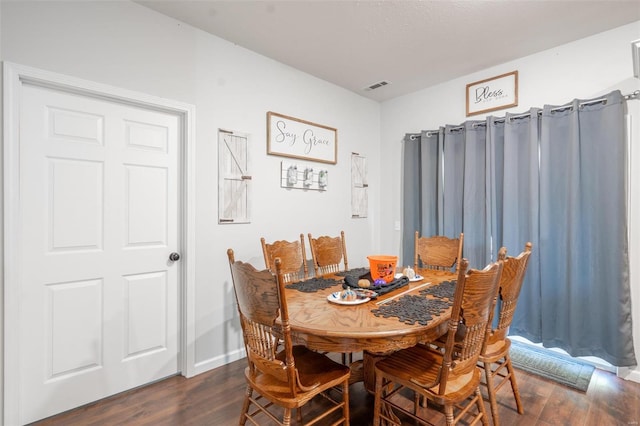 45 Justin Ave, Van Buren, MO 63965 - dining area with dark wood finished floors and baseboards