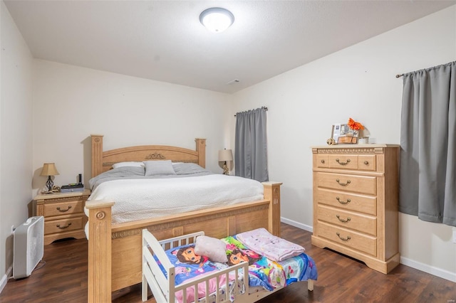 45 Justin Ave, Van Buren, MO 63965 - bedroom featuring dark wood-style flooring and baseboards