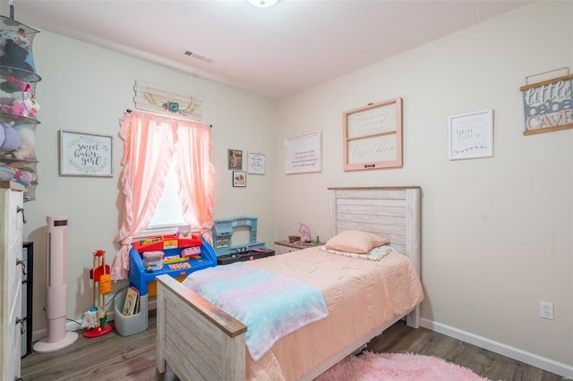 45 Justin Ave, Van Buren, MO 63965 - bedroom featuring wood finished floors and baseboards