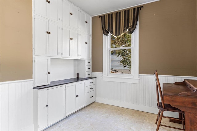 94 Jersey Ln, Bloomsdale, MO 63627 - dining room featuring a wainscoted wall and light tile patterned flooring
