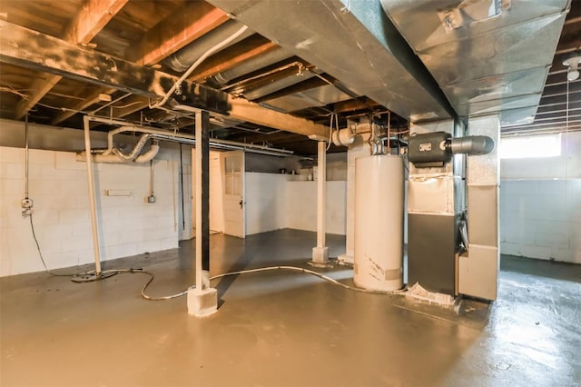 9608 Flora Ave, Saint Louis, MO 63114 - unfinished below grade area featuring gas water heater and heating unit
