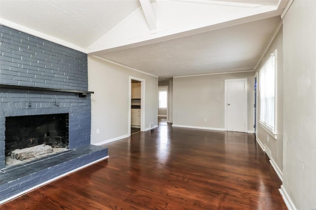 9608 Flora Ave, Saint Louis, MO 63114 - unfurnished living room with plenty of natural light, wood finished floors, and a brick fireplace
