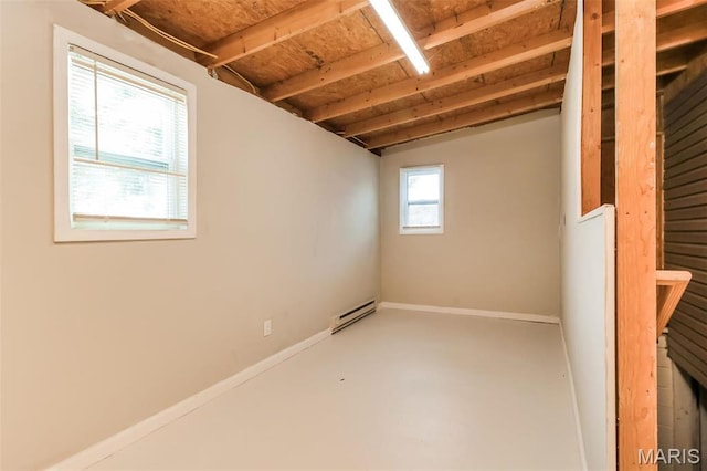 9608 Flora Ave, Saint Louis, MO 63114 - below grade area with a baseboard heating unit and baseboards