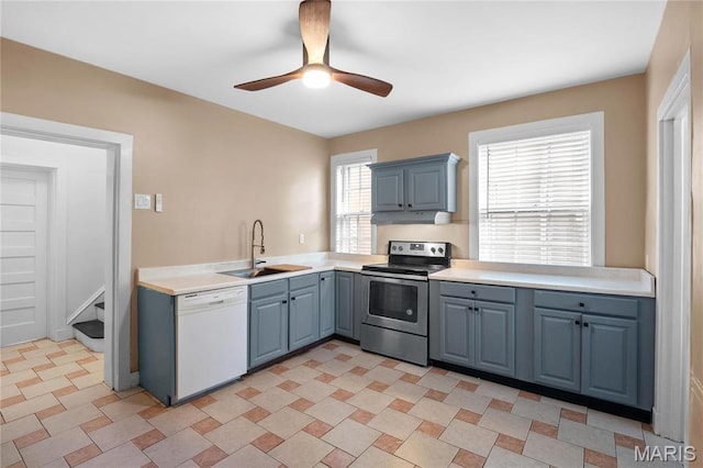 5099 Waterman Blvd, Saint Louis, MO 63108 - kitchen featuring electric range, dishwasher, a sink, ceiling fan, and light countertops
