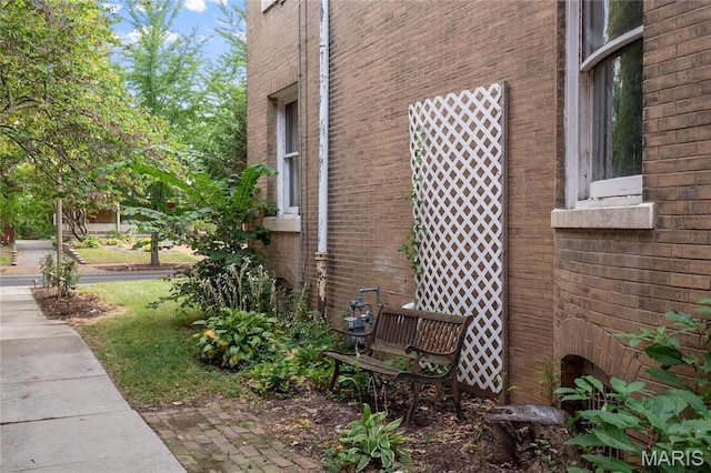 5099 Waterman Blvd, Saint Louis, MO 63108 - view of home's exterior featuring brick siding