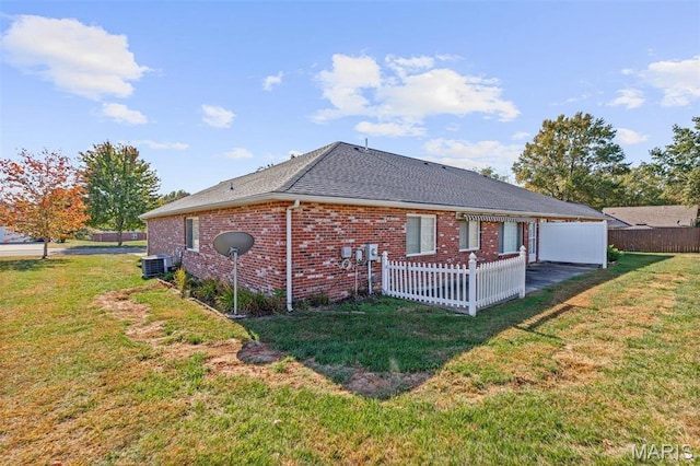 119 Ohio Ct, Farmington, MO 63640 - rear view of house with cooling unit, roof with shingles, and brick siding