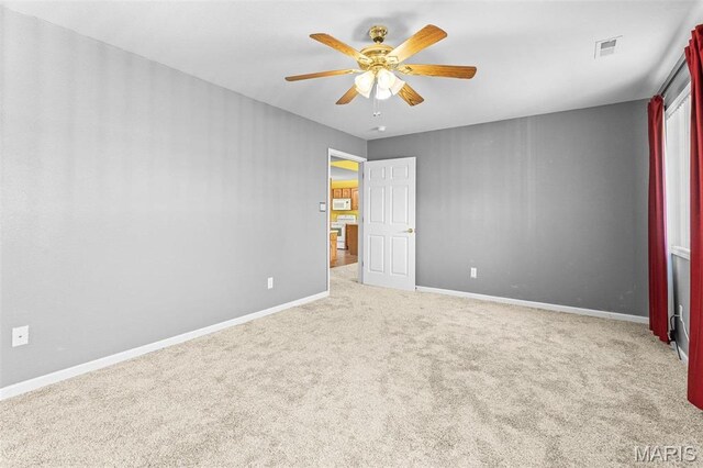 119 Ohio Ct, Farmington, MO 63640 - unfurnished bedroom with carpet floors, baseboards, and a ceiling fan