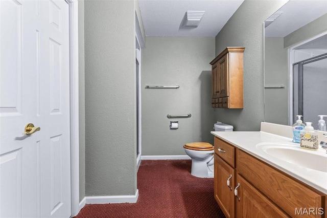 119 Ohio Ct, Farmington, MO 63640 - full bath featuring a stall shower, vanity, toilet, baseboards, and a textured wall