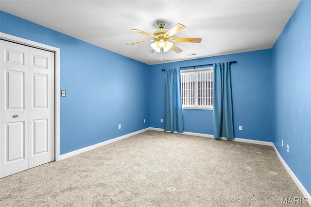 119 Ohio Ct, Farmington, MO 63640 - carpeted empty room featuring a ceiling fan and baseboards