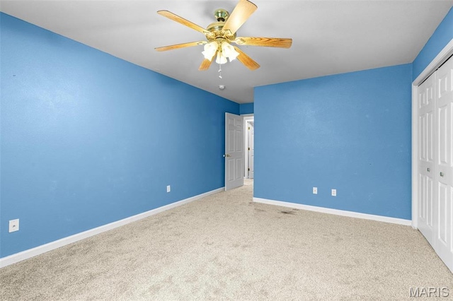 119 Ohio Ct, Farmington, MO 63640 - unfurnished bedroom with carpet, a closet, baseboards, and ceiling fan