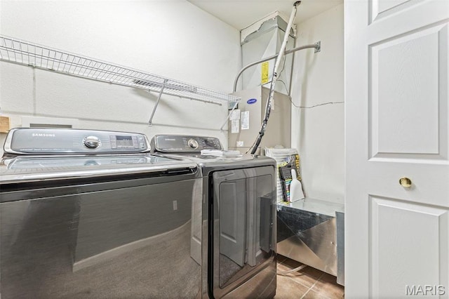 119 Ohio Ct, Farmington, MO 63640 - washroom featuring washer and dryer and tile patterned flooring