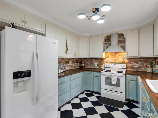 575 E Villa Ridge Rd, Villa Ridge, MO 63089 - kitchen featuring white appliances, wall chimney range hood, light flooring, and blue cabinets