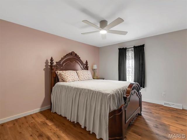 575 E Villa Ridge Rd, Villa Ridge, MO 63089 - bedroom featuring wood finished floors and a ceiling fan