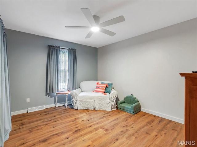 575 E Villa Ridge Rd, Villa Ridge, MO 63089 - living area featuring ceiling fan and light wood-style flooring