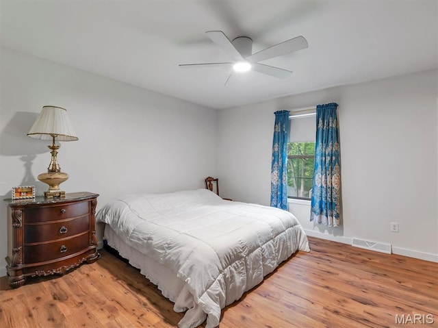 575 E Villa Ridge Rd, Villa Ridge, MO 63089 - bedroom with wood finished floors and ceiling fan