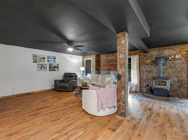 575 E Villa Ridge Rd, Villa Ridge, MO 63089 - living room with a wood stove, wood finished floors, and a ceiling fan