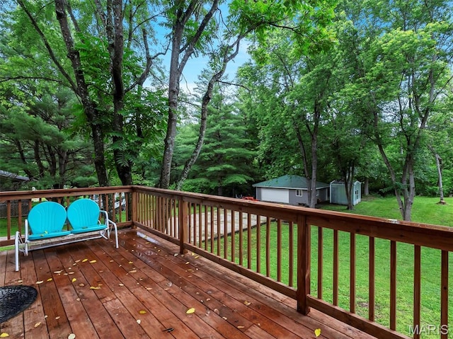 575 E Villa Ridge Rd, Villa Ridge, MO 63089 - deck with a detached garage, a yard, and a storage shed