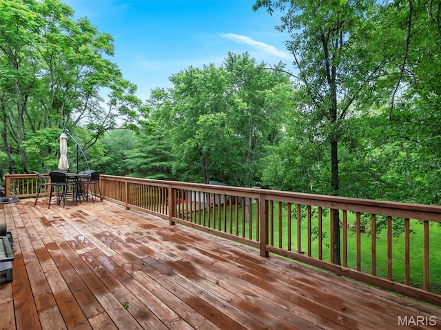 575 E Villa Ridge Rd, Villa Ridge, MO 63089 - wooden deck featuring outdoor dining space and a yard