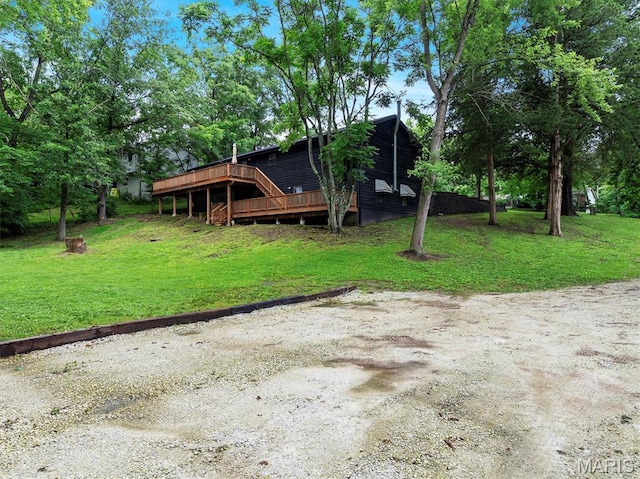 575 E Villa Ridge Rd, Villa Ridge, MO 63089 - view of front of house with a deck and a front yard