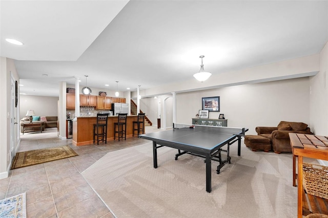 rec room featuring recessed lighting, light tile patterned floors, and baseboards