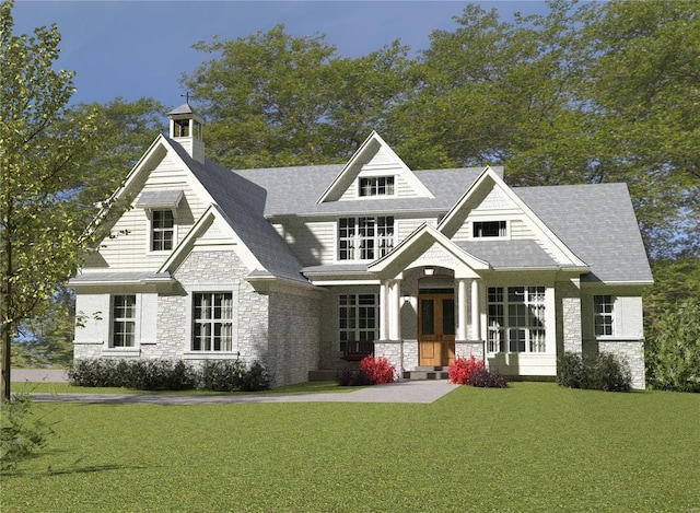 13218 Lochenheath Ct, Town And Country, MO 63131 - rear view of house featuring a lawn, stone siding, a porch, and french doors