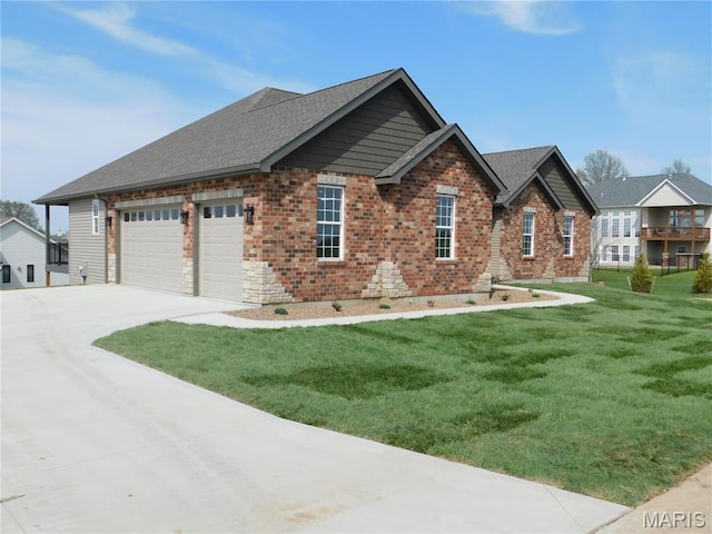 view of front of property with driveway, brick siding, a front lawn, a garage, and a shingled roof