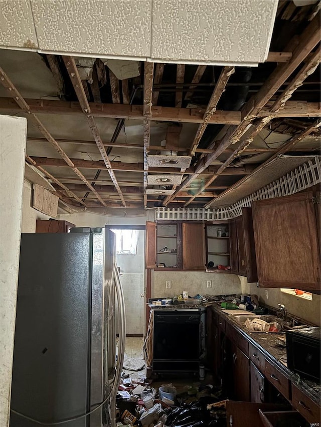 530 N Duncan St, Marine, IL 62061 - kitchen with freestanding refrigerator, open shelves, dark countertops, a sink, and dark brown cabinets