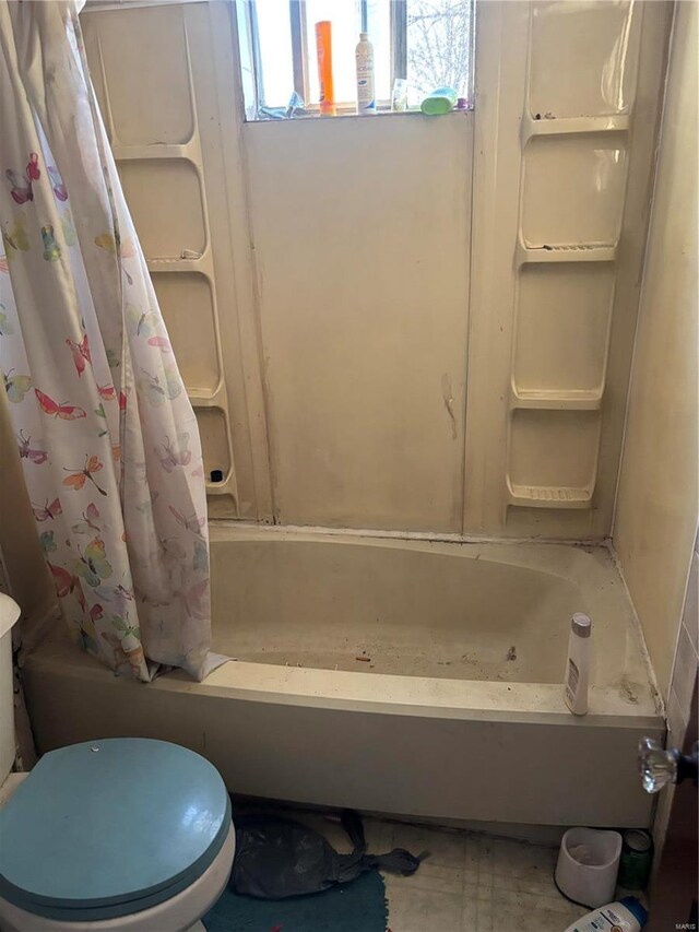 530 N Duncan St, Marine, IL 62061 - bathroom featuring toilet and shower / bathtub combination with curtain