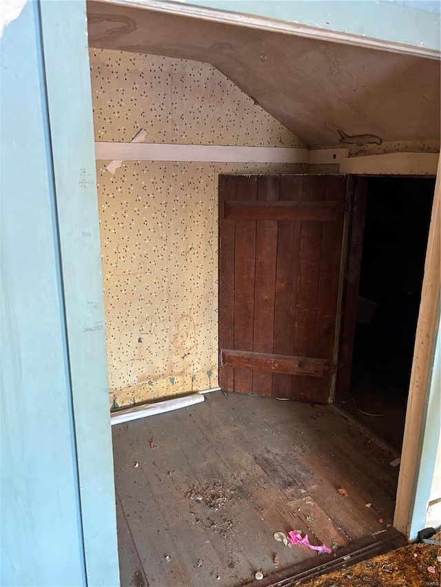 530 N Duncan St, Marine, IL 62061 - unfurnished room featuring hardwood / wood-style floors and lofted ceiling
