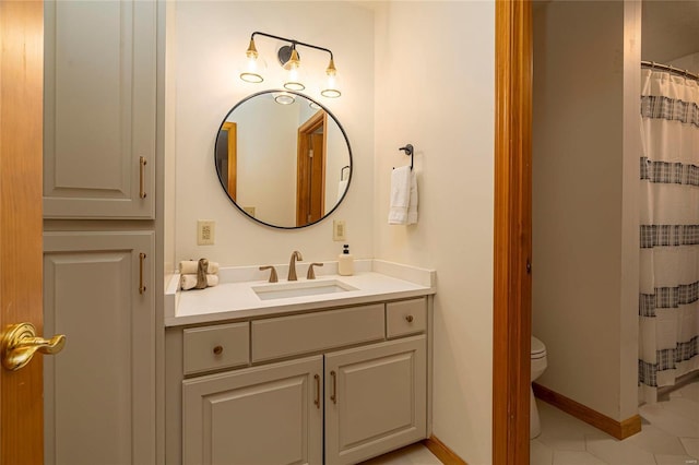 bathroom with toilet, vanity, curtained shower, and tile patterned floors