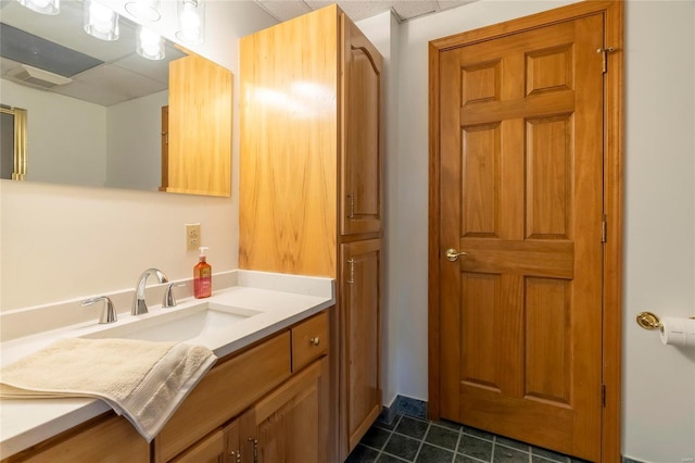 bathroom with vanity and tile patterned floors