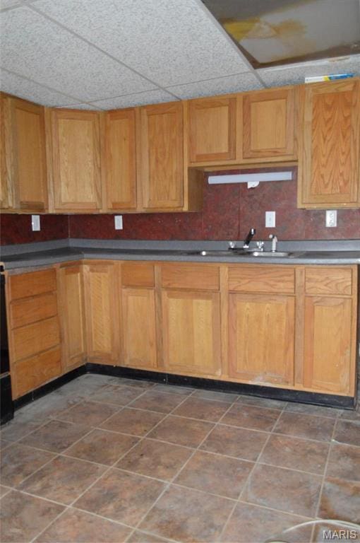 2108 Holland St, Alton, IL 62002 - kitchen featuring a sink and tile patterned floors