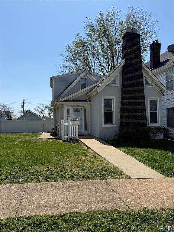 view of front of home featuring stucco siding
