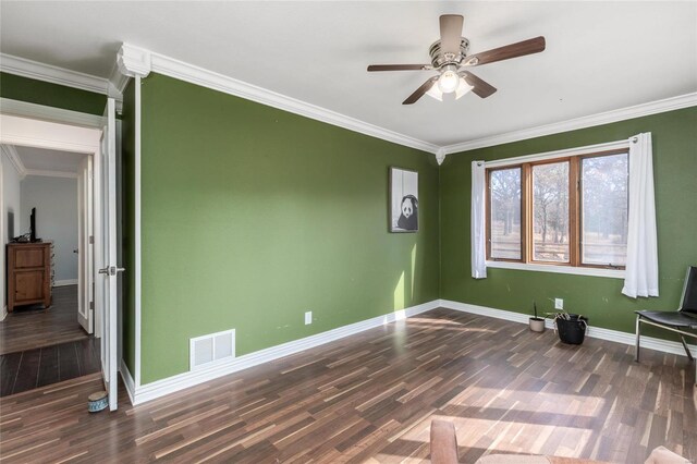 24950 State Rd A, Richland, MO 65556 - spare room with wood finished floors, baseboards, a ceiling fan, and ornamental molding