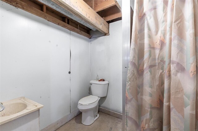 24950 State Rd A, Richland, MO 65556 - bathroom with toilet, a shower with shower curtain, unfinished concrete flooring, and vanity