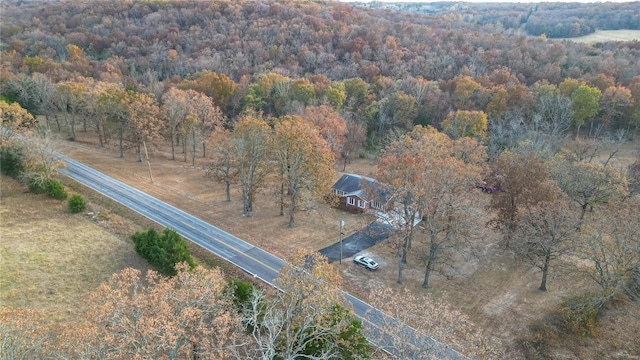 24950 State Rd A, Richland, MO 65556 - aerial overview of property's location with a heavily wooded area