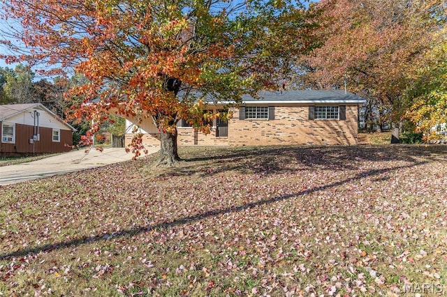 2637 Forest View St, Poplar Bluff, MO 63901 - view of front of house featuring concrete driveway and brick siding