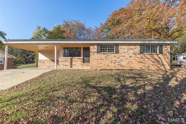 2637 Forest View St, Poplar Bluff, MO 63901 - view of front of house featuring brick siding, concrete driveway, an attached carport, and a front yard