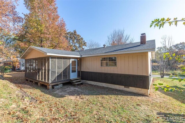 2637 Forest View St, Poplar Bluff, MO 63901 - back of house with entry steps, a shingled roof, a chimney, a sunroom, and crawl space