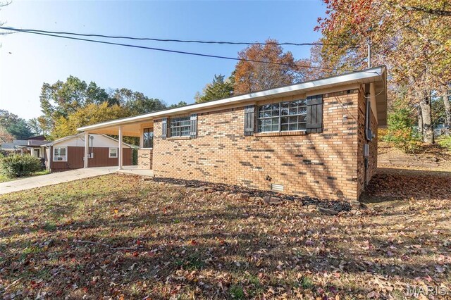 2637 Forest View St, Poplar Bluff, MO 63901 - view of home's exterior with brick siding