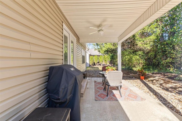 view of patio featuring ceiling fan and a grill